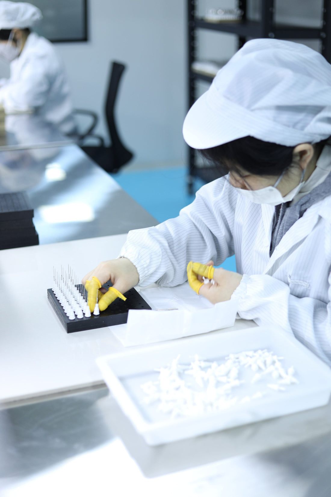 Tattoo cartridge needle assembly process including needle bonding and UV curing at CREDITECH MED factory