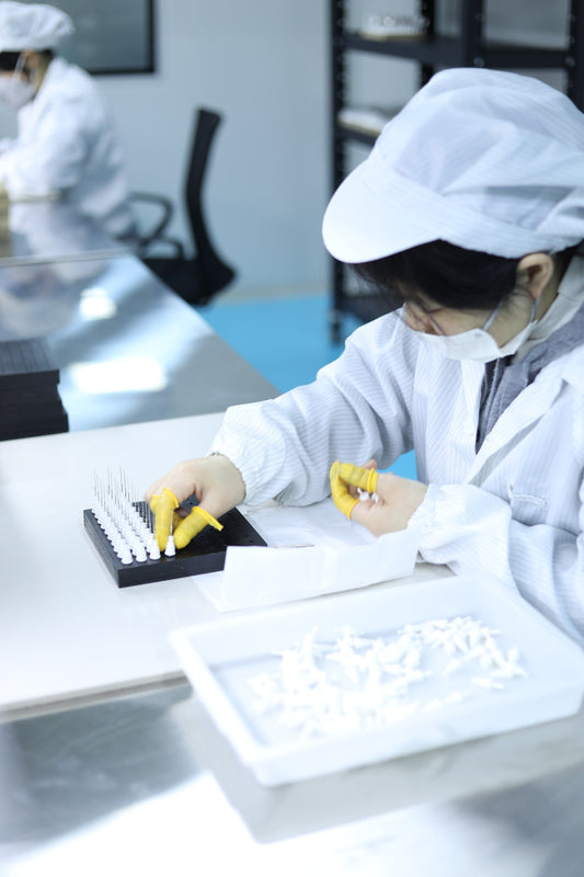 Tattoo cartridge needle assembly process including needle bonding and UV curing at CREDITECH MED factory