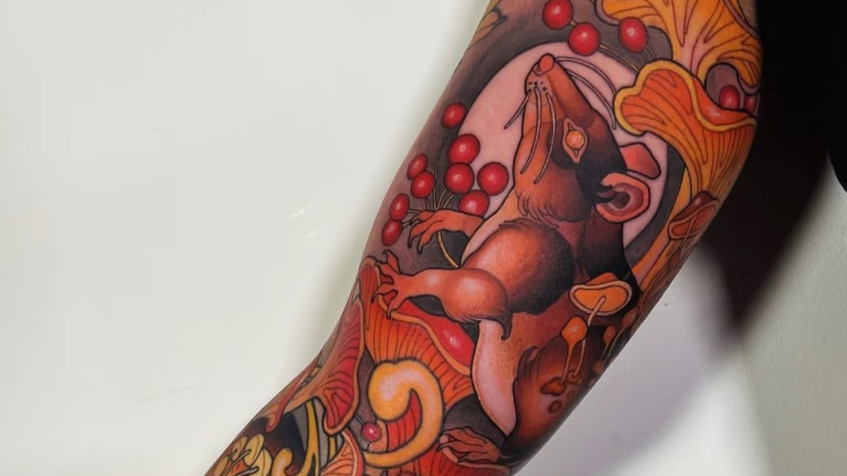 CREDITECH MED Neo Traditional Tattoo Style with vibrant colors and detailed linework